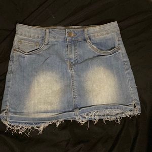 Small Light blue jean skirt.